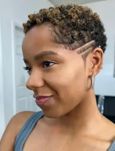 Short Curly Haircut With Side Design